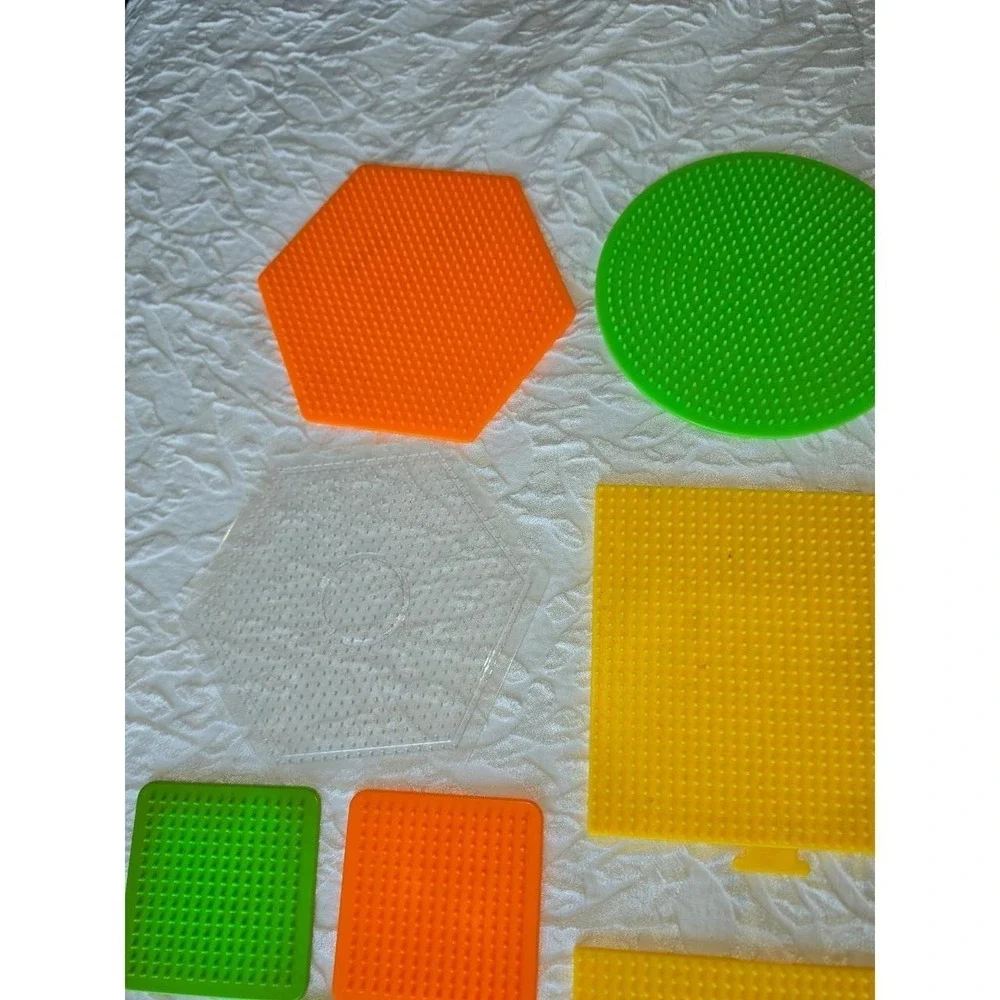 Lot D Perler bead pegboards in various shapes and bright colors